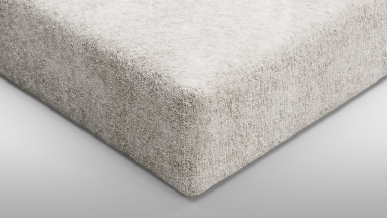 Redefining Relaxation | The cushioning of the sofa provides a unique seating experience that combines softness with support, ensuring that the sofa remains comfortable for extended periods. The sofa’s low profile and generous dimensions encourage a laid-back lounging posture, making it perfect for both casual and formal settings.

