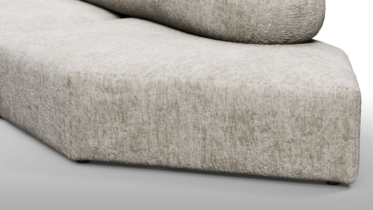 Redefining Relaxation | The cushioning of the sofa provides a unique seating experience that combines softness with support, ensuring that the sofa remains comfortable for extended periods. The sofa’s low profile and generous dimensions encourage a laid-back lounging posture, making it perfect for both casual and formal settings.

