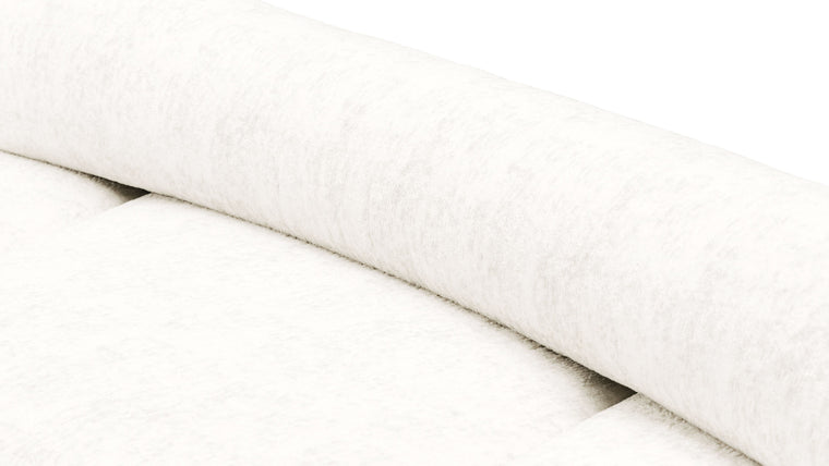 Redefining Relaxation | The cushioning of the sofa provides a unique seating experience that combines softness with support, ensuring that the sofa remains comfortable for extended periods. The sofa’s low profile and generous dimensions encourage a laid-back lounging posture, making it perfect for both casual and formal settings.

