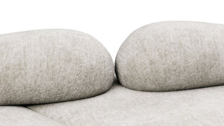 Redefining Relaxation | The cushioning of the sofa provides a unique seating experience that combines softness with support, ensuring that the sofa remains comfortable for extended periods. The sofa’s low profile and generous dimensions encourage a laid-back lounging posture, making it perfect for both casual and formal settings.
