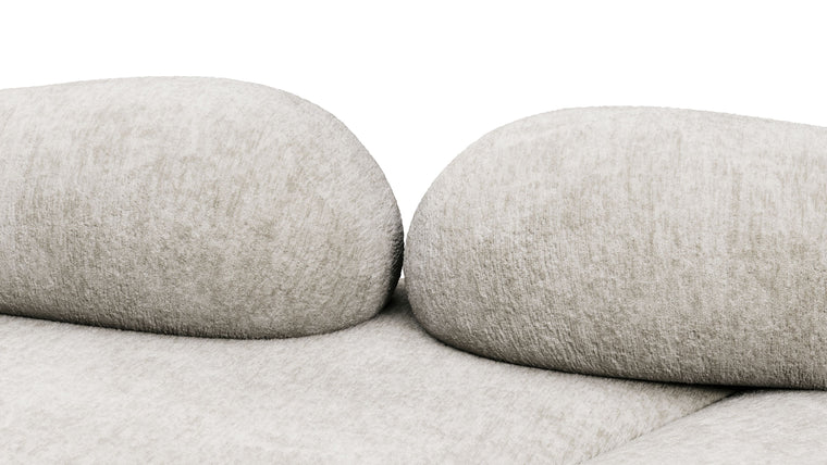 Redefining Relaxation | The cushioning of the sofa provides a unique seating experience that combines softness with support, ensuring that the sofa remains comfortable for extended periods. The sofa’s low profile and generous dimensions encourage a laid-back lounging posture, making it perfect for both casual and formal settings.
