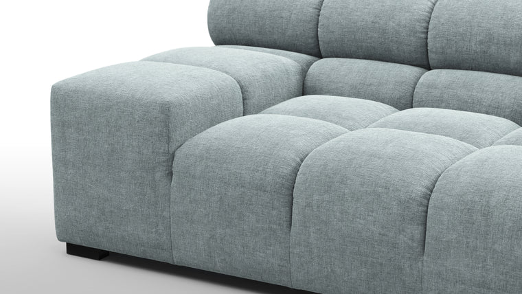 SUPERIOR COMFORT | Designed with the easy-going, informal ethos of the 1970s in mind, the Tufty modules are generously proportioned, coming together in a bench-like base with barely-there connections, allowing plenty of room for you to lean back and curl up in comfort.
