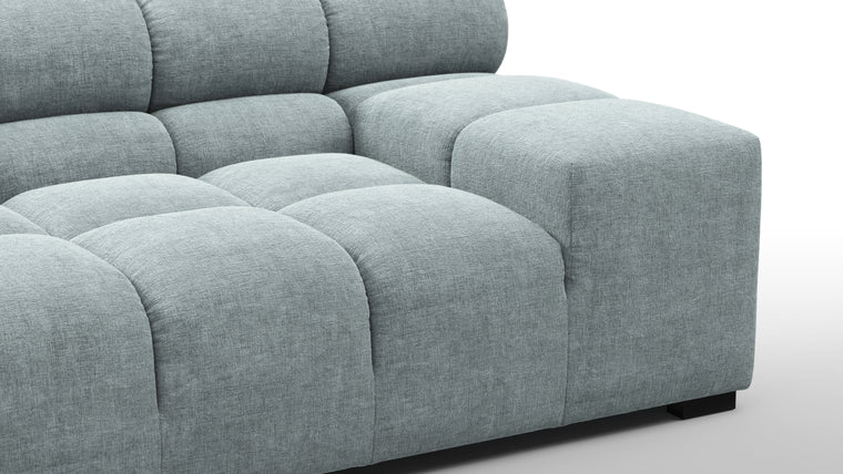 SUPERIOR COMFORT | Designed with the easy-going, informal ethos of the 1970s in mind, the Tufty modules are generously proportioned, coming together in a bench-like base with barely-there connections, allowing plenty of room for you to lean back and curl up in comfort.
