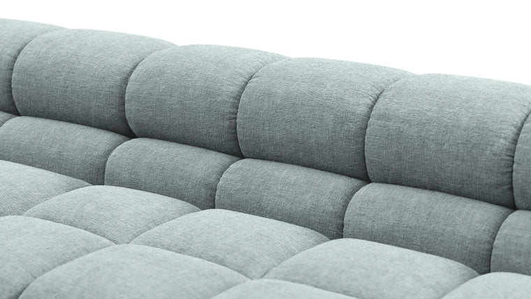 SUPERIOR COMFORT | Designed with the easy-going, informal ethos of the 1970s in mind, the Tufty modules are generously proportioned, coming together in a bench-like base with barely-there connections, allowing plenty of room for you to lean back and curl up in comfort.
