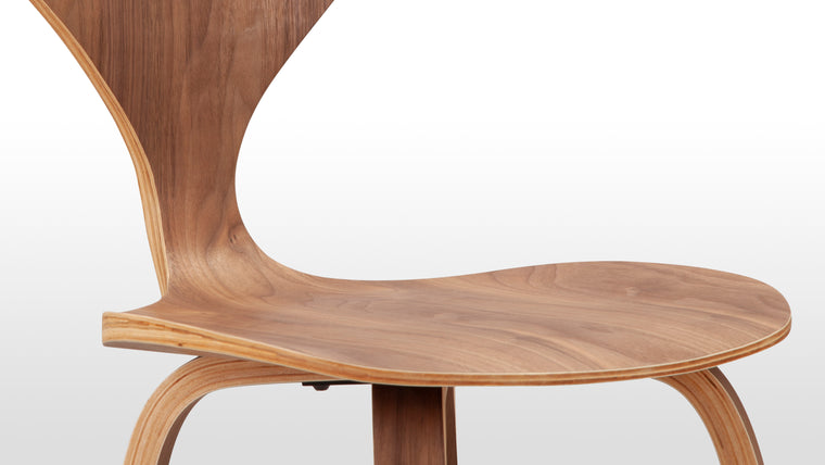 SLEEK SILHOUETTE | Recognizable anywhere, the elegant curves of the Norman Stool's backrest and legs offer a subtle but impactful design choice which visually soften the chair's form. Surprisingly light and comfortable, the Norman collection is designed to mold to the human form, providing support without compromising on style.
