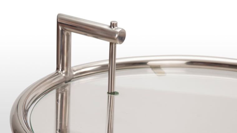 Boundless versatility|The circular top can be raised or lowered to different heights, making it versatile and adaptable for various uses. This design innovation was ahead of its time and showcased a forward-thinking approach to furniture design.
