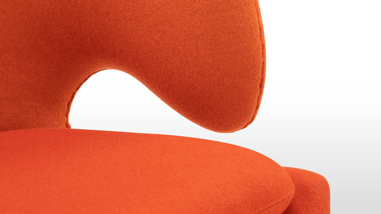 TAKING SHAPE | Flaunting a profile unlike any other, the Pelican Chair makes a striking first impression. Plus, its wraparound arms and soft curves promise to gently embrace and support you every time you take a seat.
