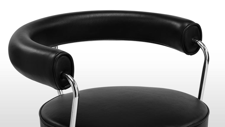 Simply Ingenious | Its curved top multitasks as a two-in-one backrest and armrest. So this chair supports you and looks great doing it. 
