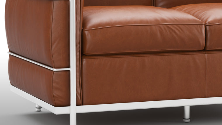 Luxurious Leather | Crafted from premium leather, the Petit Modele collection exudes an air of opulence. The leather's supple texture not only feels heavenly to the touch but also ages beautifully, developing a rich patina over time that tells the story of its use.
