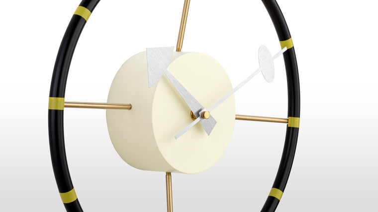 Functional Decor | Crafted of steel and aluminum by artisans, this chic timepiece is made to last. It’s pretty, practical, and always comes in handy when you need to check the time.  
