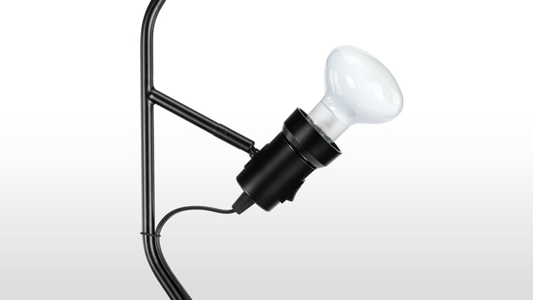 Industrial Illumination | Able to slide up and down on a steel cable that’s mounted to the ceiling and weighted at the bottom for tension, the Tangente lamp gives you endless lighting possibilities. 
