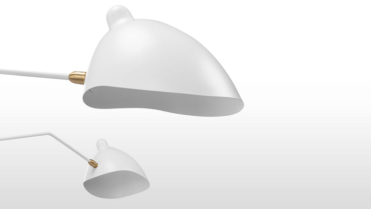 ART MEETS FUNCTION | With beautiful sculptural qualities and sense of movement, these lamps are widely regarded as pieces of art as much as lighting fixtures, marrying practicality with visual intrigue.
