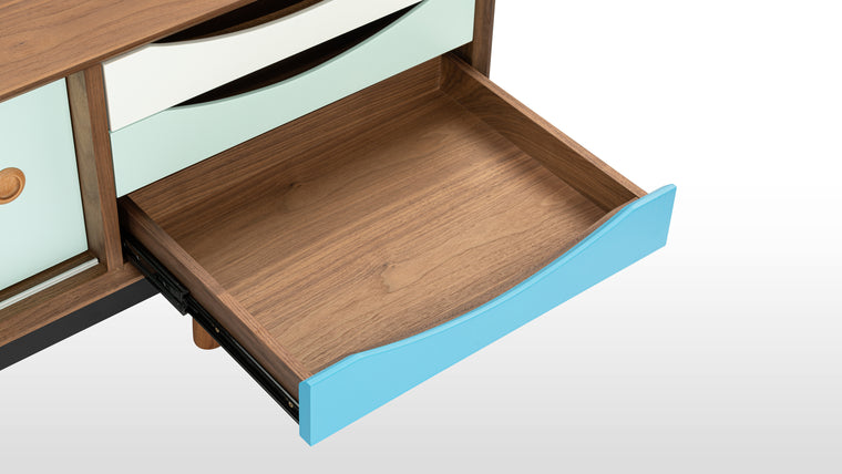 QUALITY DETAILS | This sophisticated credenza features a gorgeous walnut veneer with pops of color, and solid walnut wood legs that are angled and tapered. It’s a long-lasting construction that will thrive in casual or formal spaces for numerous years.
