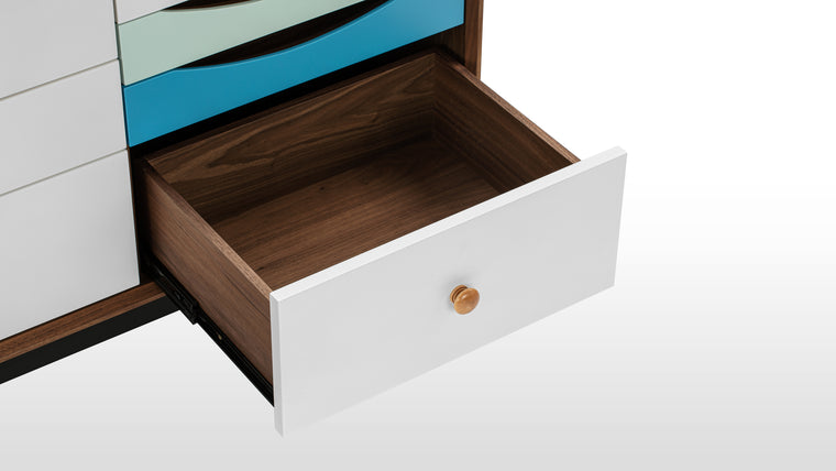 MID-CENTURY MASTERPIECE | With its clean silhouette, lacquered gradient drawer fronts, and round hardware, this credenza exhibits mid-century modern elegance at its best. 
