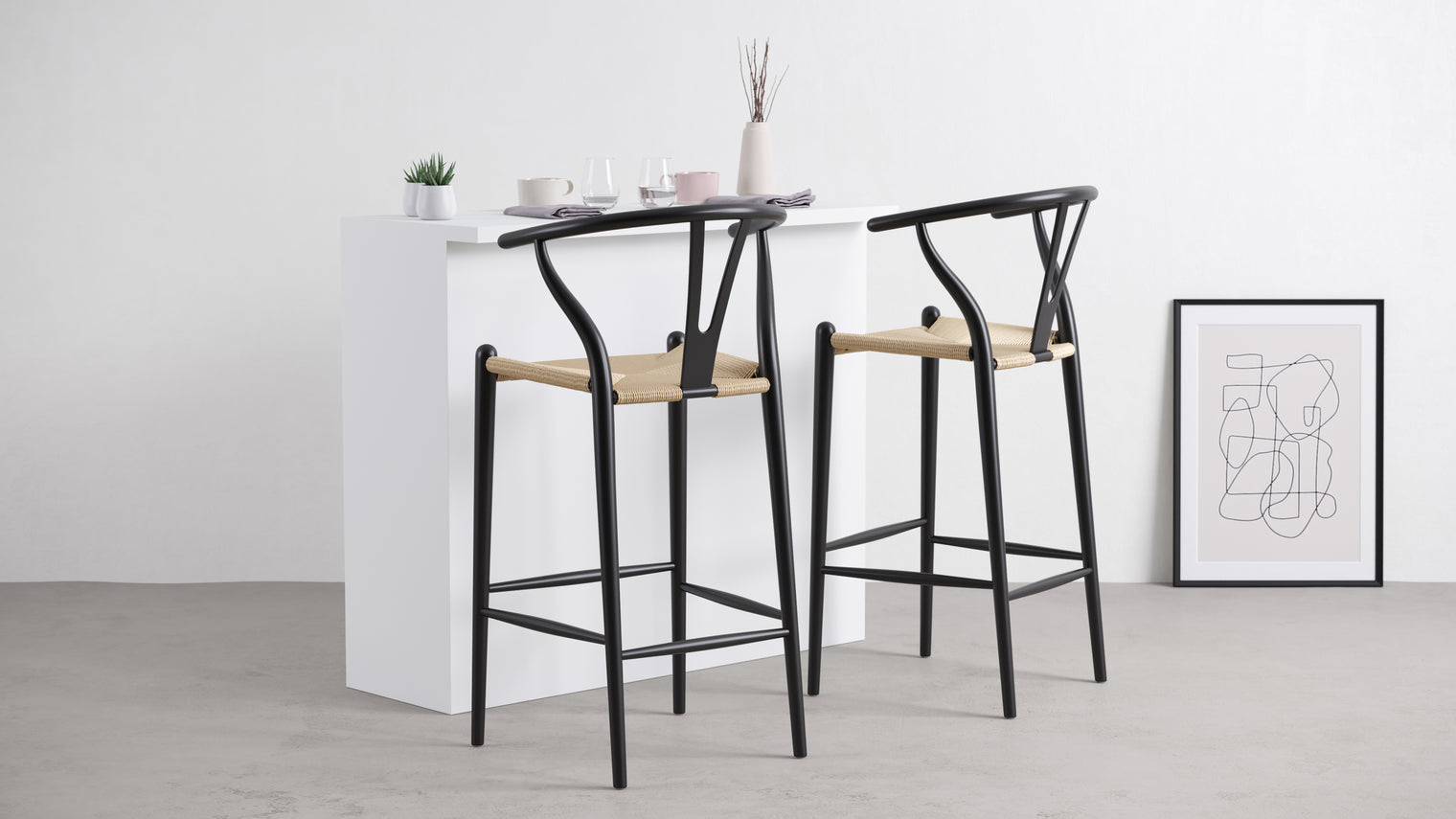 A SEATING ICON TRANSFORMED | A perfect complement to the beloved Wish Chair, this bar stool literally elevates the style in your bar area, on the patio, and more. This iconic Scandinavian silhouette with its intricate handwoven seat and two-prong backrest is a modern classic, allowing you to bring in a touch of Danish style.
