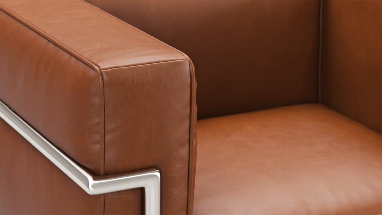 Cloud like comfort|The Grand Modele Armchair begs you to make yourself comfortable in its plump cushions, which gently cradle you and impart an ethereal experience to any living space. Welcome to heaven on earth. 
