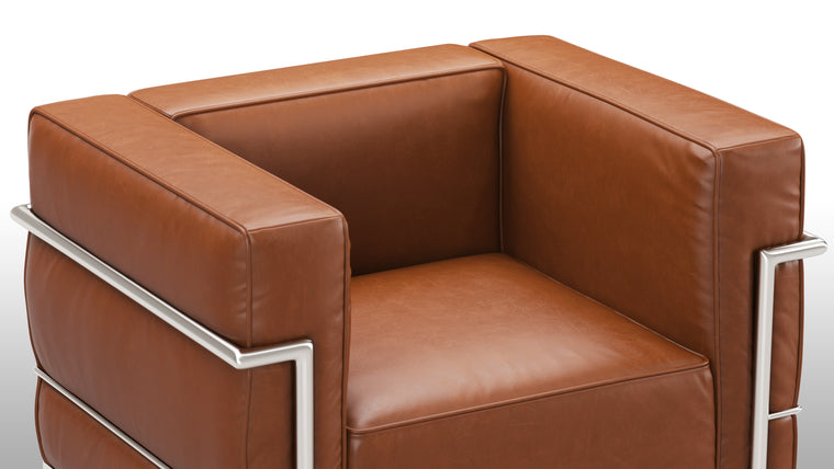 Low Profile|With its back and armrests at the same height, this unique piece creates more visual space and gives you lots of support all at once. Who said clean lines couldn’t be cozy too? 

