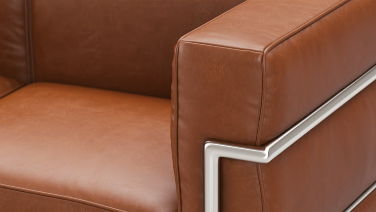 Cloud like comfort|The Grand Modele Two-Person Sofa begs you to make yourself (and a plus one) comfortable in its plump cushions, which gently cradle you and impart an ethereal experience to any living space. Welcome to heaven on earth.

