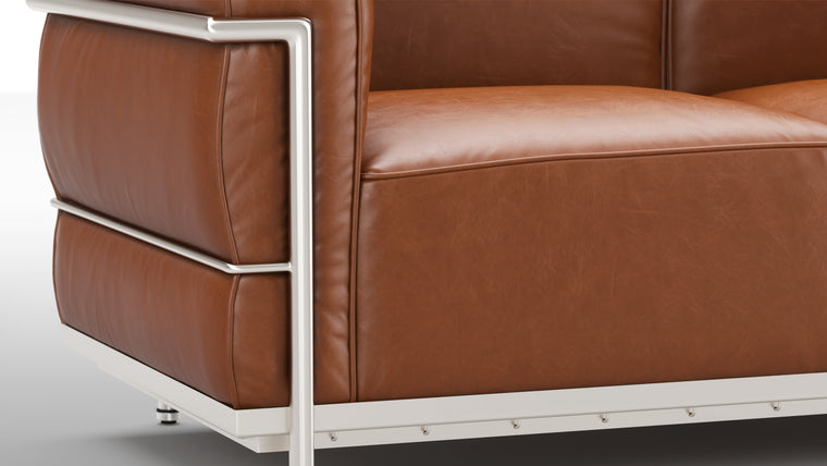 Low profile|With its back and armrests at the same height, this unique piece creates more visual space and gives you lots of support all at once. Who said clean lines couldn’t be cozy too?
