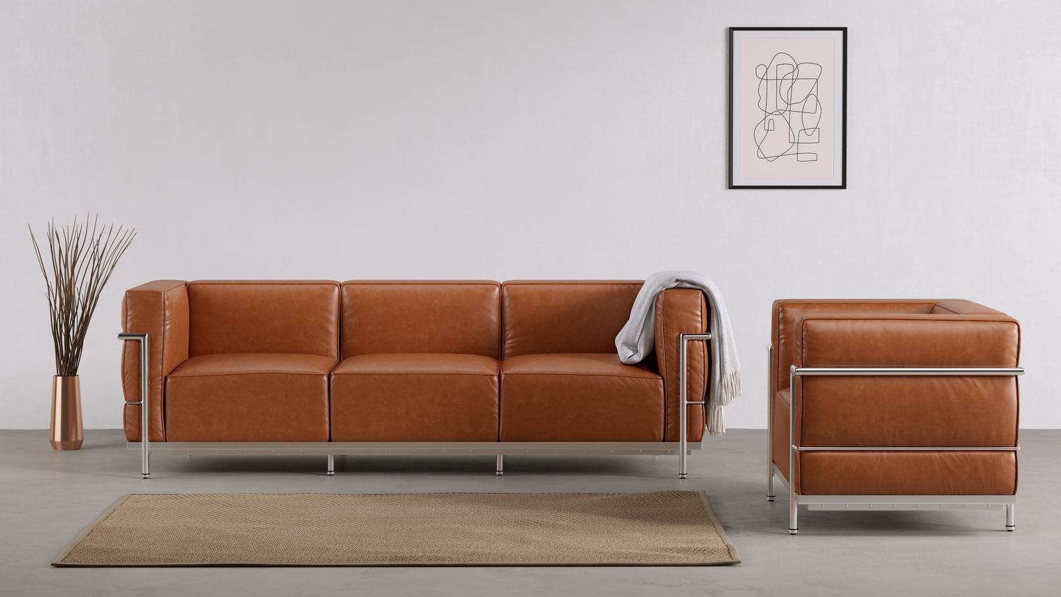 A Modern Makeover|Inspired by the classic club chair, the tempting, modern form of the Grand Modele Sofa features deep seating and a minimalist, external steel frame.
