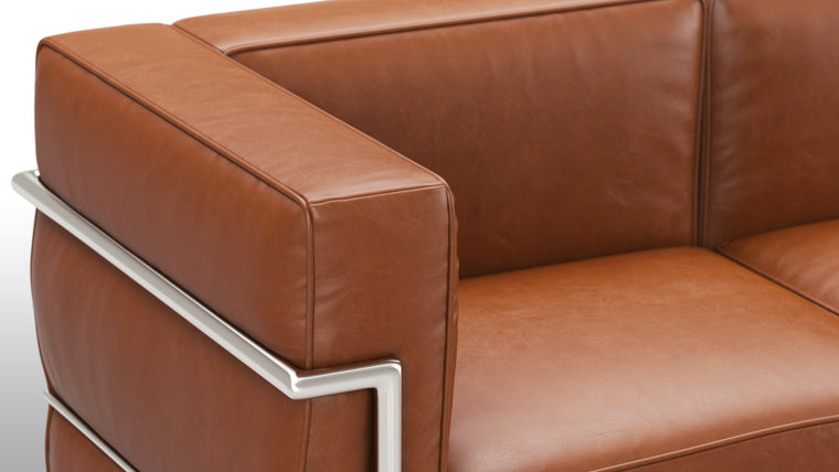 Cloud like comfort|The Grand Modele Three-Person Sofa begs you to make yourself (and a couple friends) comfortable in its plump cushions, which gently cradle you and impart an ethereal experience to any living space. Welcome to heaven on earth.
