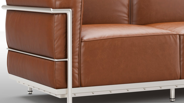 Low Profile|With its back and armrests at the same height, this unique piece creates more visual space and gives you lots of support all at once. Who said clean lines couldn’t be cozy too? 
