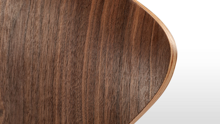 Elegance and Longevity | Constructed from plywood layers with a high-quality walnut veneer finish and steel footrest, the Norman Counter Stool is deceptively strong and durable in spite of its graceful appearance.
